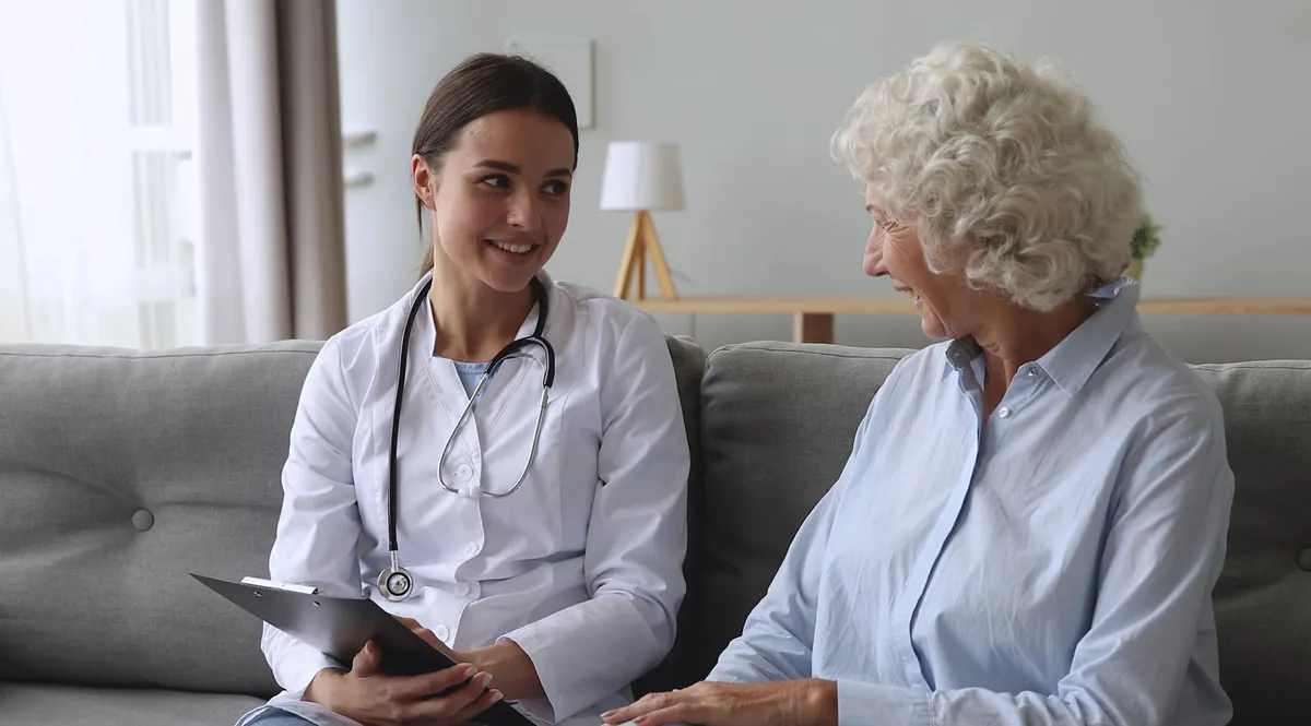 Pulse Home Health provider meeting with a senior in their home