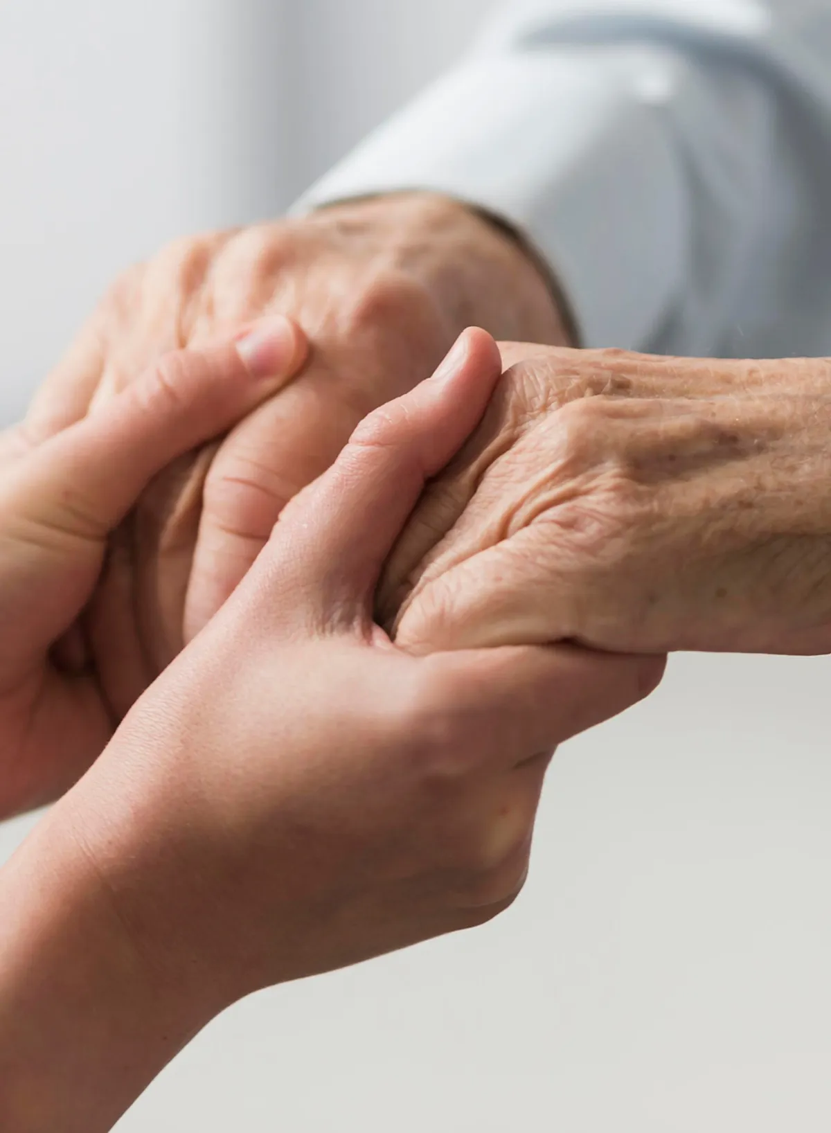 Pulse Hospice Care nurse offering compassionate hand-in-hand support